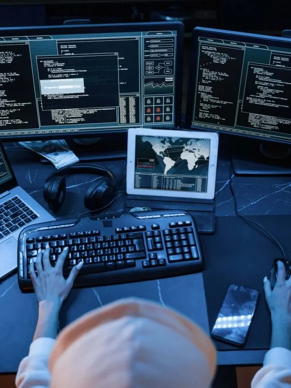 Security analyst working at a computer